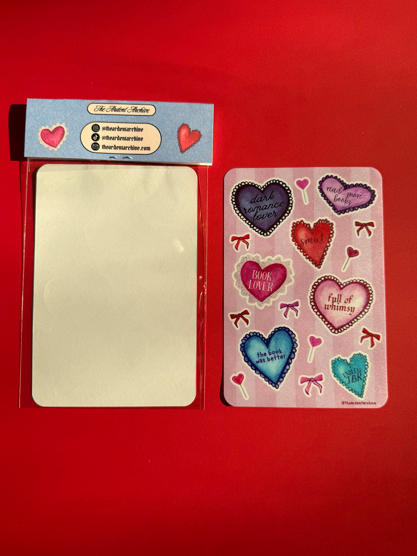 The back of the packaged sticker sheet, and the front of an unpackaged sticker sheet next to it.