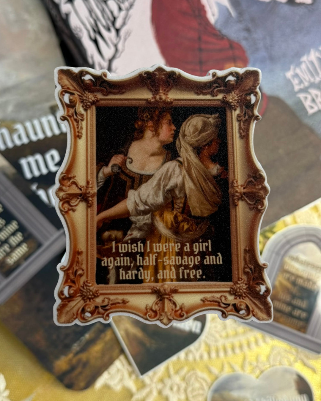 Decorative sticker with ornate frame and text on a collage background