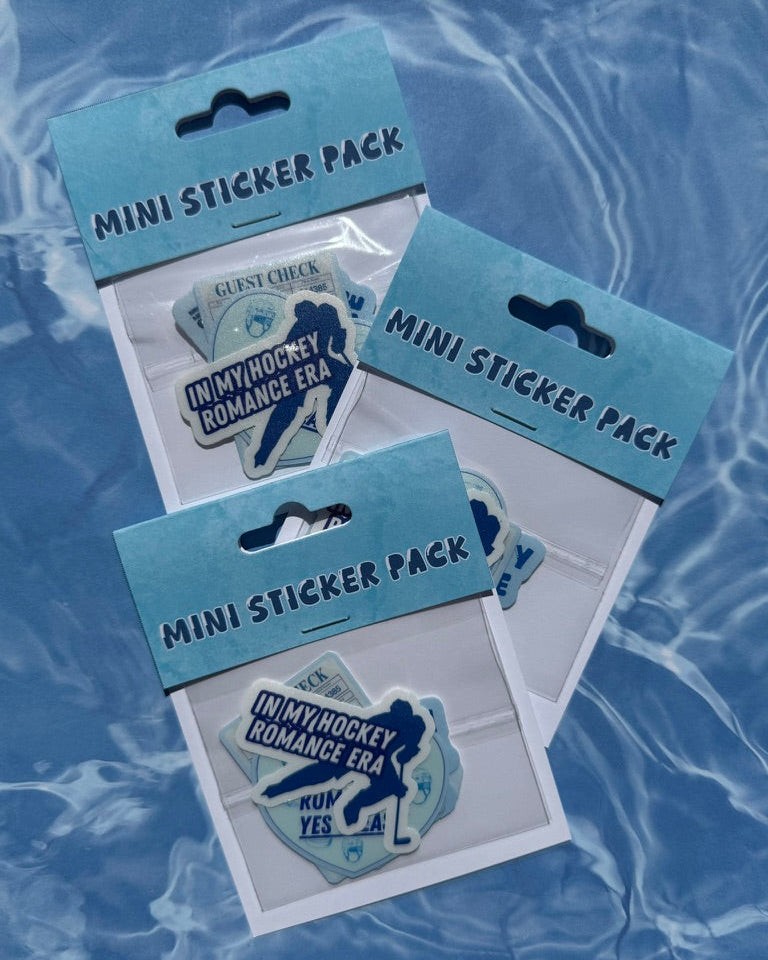Three mini sticker packs with hockey-themed stickers on a blue water background