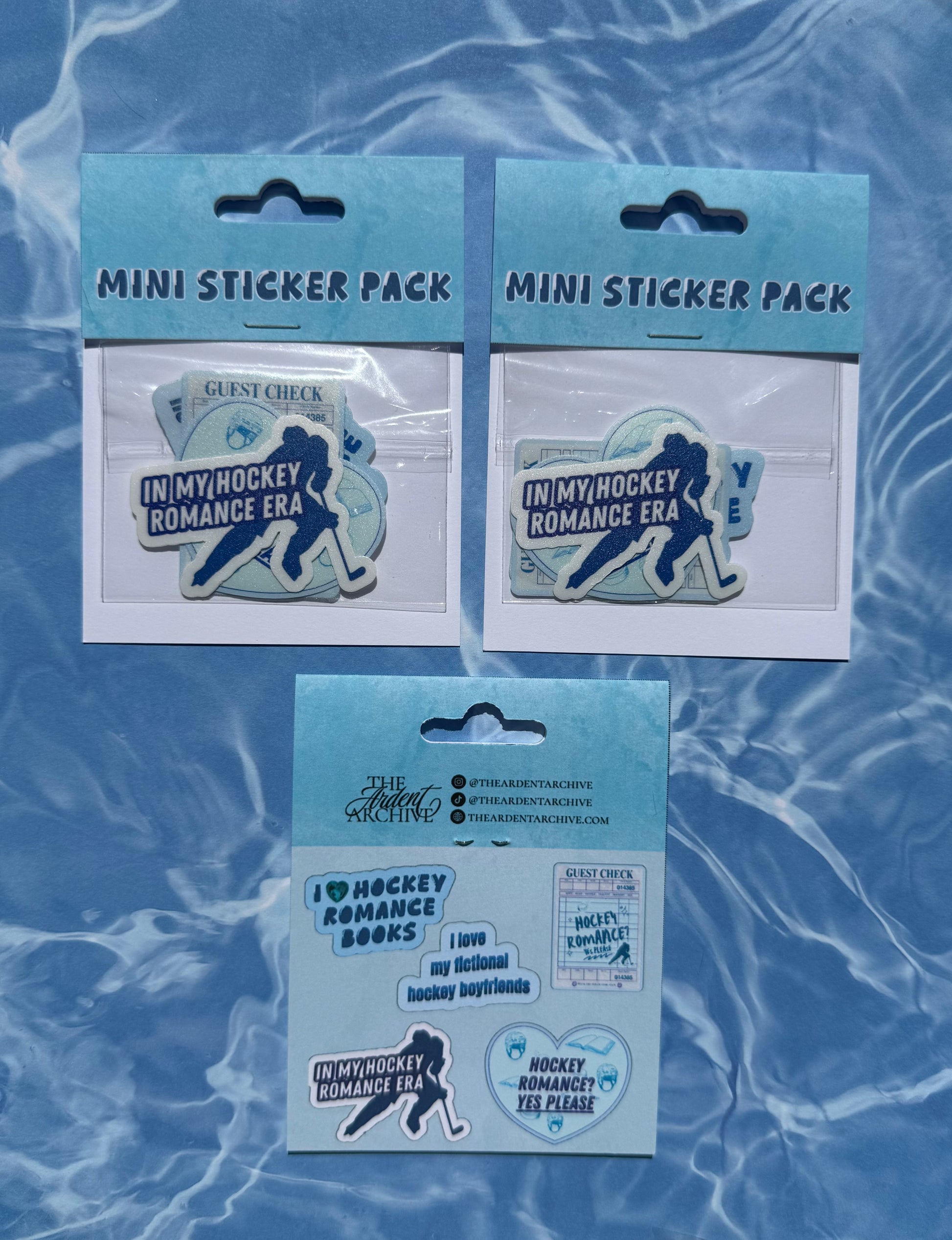 Three mini sticker packs with 'In My Hockey Romance Era' theme on a blue textured background.