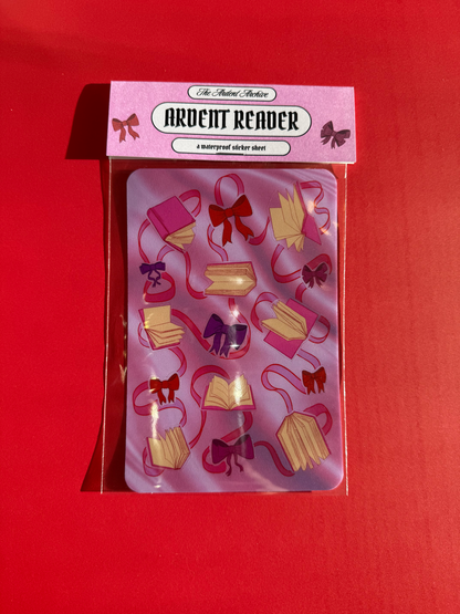 Sticker sheet of decorative ribbons and bows on a pink card with a red background.
