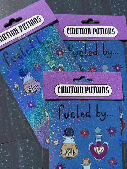 Two packages of 'Emotion Potions' stickers with colorful designs on a dark background.