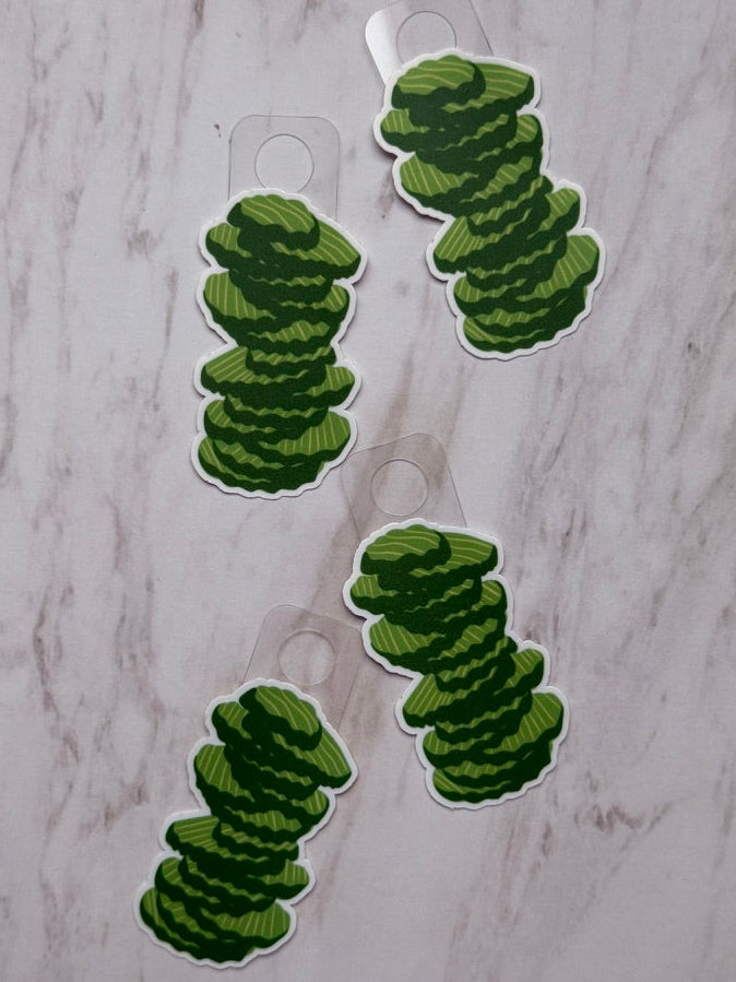 Green textured objects on a marble surface
