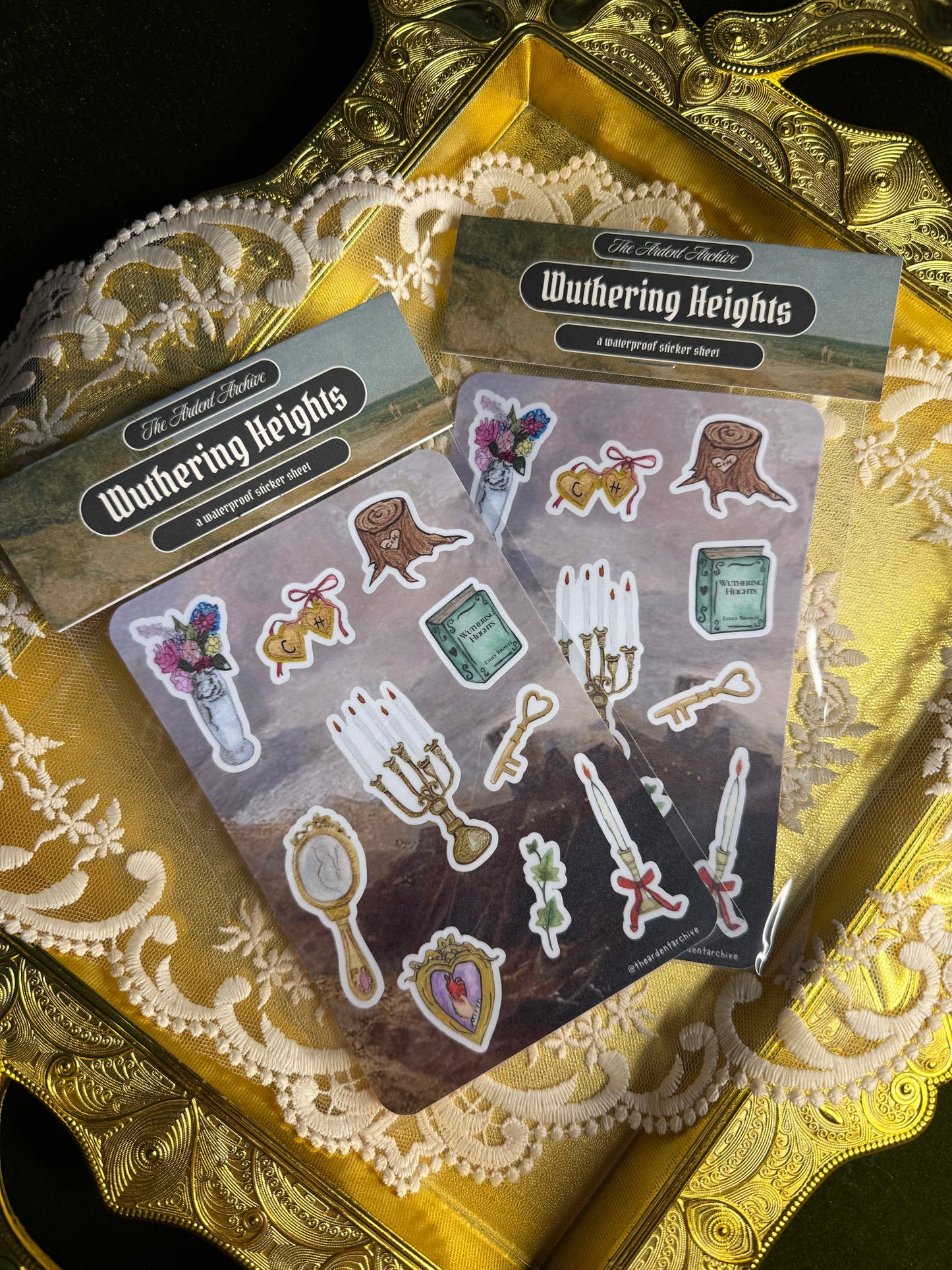 Sticker sheet titled 'Wuthering Heights' on a decorative gold surface with lace.