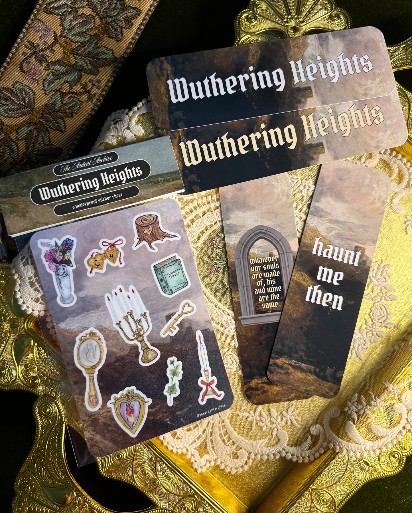 Wuthering Heights themed sticker sheet and bookmarks on a ornate surface