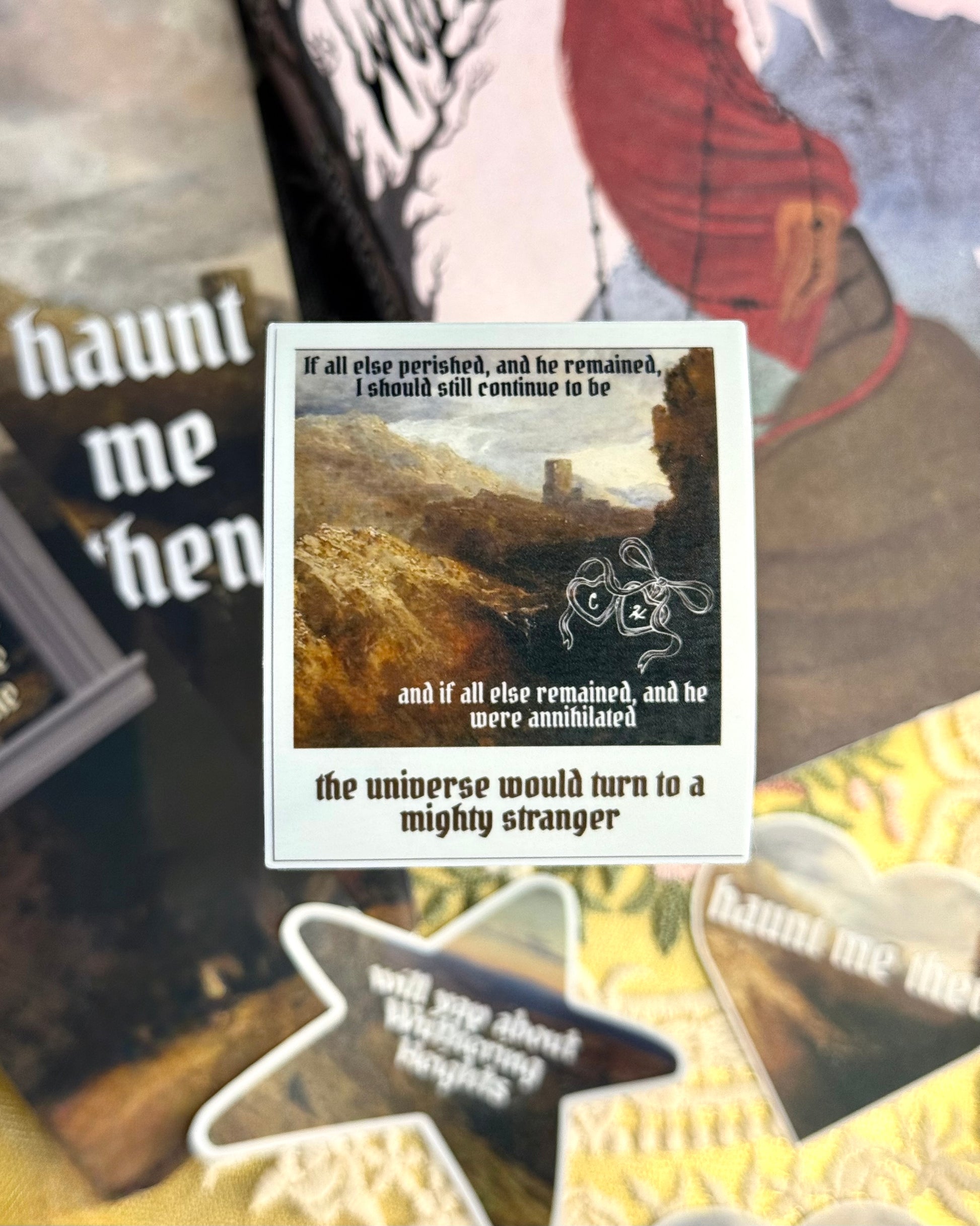 Sticker shaped like a polaroid with text and a scenic illustration on a collage background