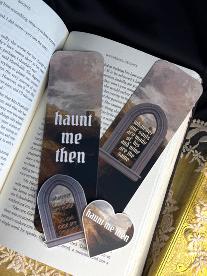 Bookmarks and stickers with 'Haunt me then' design on an open book