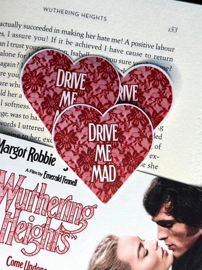 Movie ticket for 'Wuthering Heights' with heart-shaped cutout and text overlay.