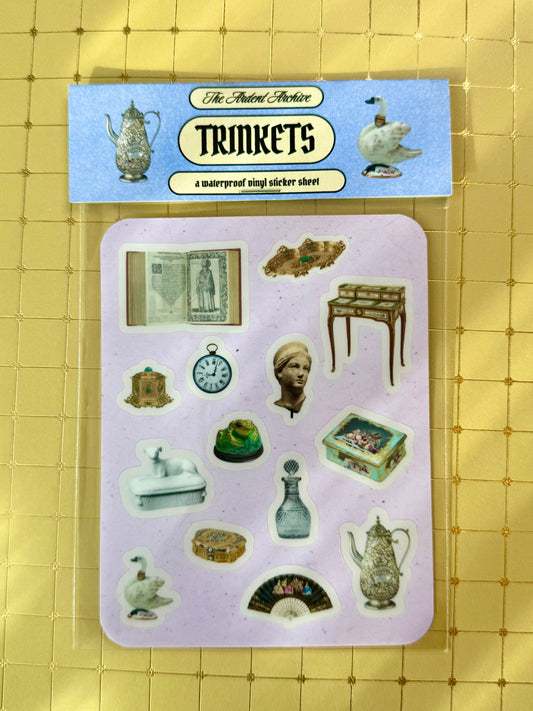 Sheet of vintage-style trinkets stickers with a blue label on a yellow grid background